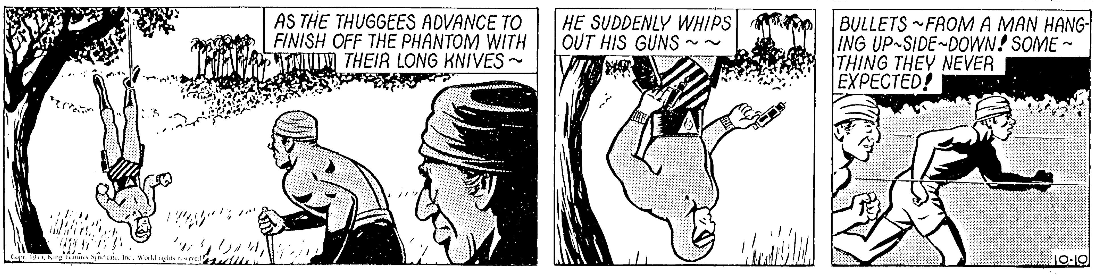 Finger OCR: AS THE THUGGEES ADVANCE TO FINISH OFF THE PHANTOM WITH THEIR LONG KNIVES - HE SUDDENLY WHIPS OUT HIS GUNS ~~ BULLETS FROM A MAN HANG- ING UP-SIDE DOWN! SOME - THING THEY NEVER EXPECTED! JO-10 AS THE THUGGEES ADVANCE TO FINISH OFF THE PHANTOM WITH THEIR LONG KNIVES - HE SUDDENLY WHIPS OUT HIS GUNS ~~ BULLETS FROM A MAN HANG- ING UP-SIDE DOWN! SOME - THING THEY NEVER EXPECTED! JO-10