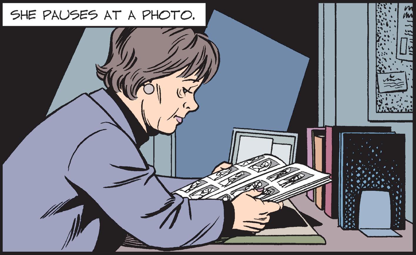 Office equipment OCR: SHE PAUSES AT A PHOTO. SHE PAUSES AT A PHOTO.