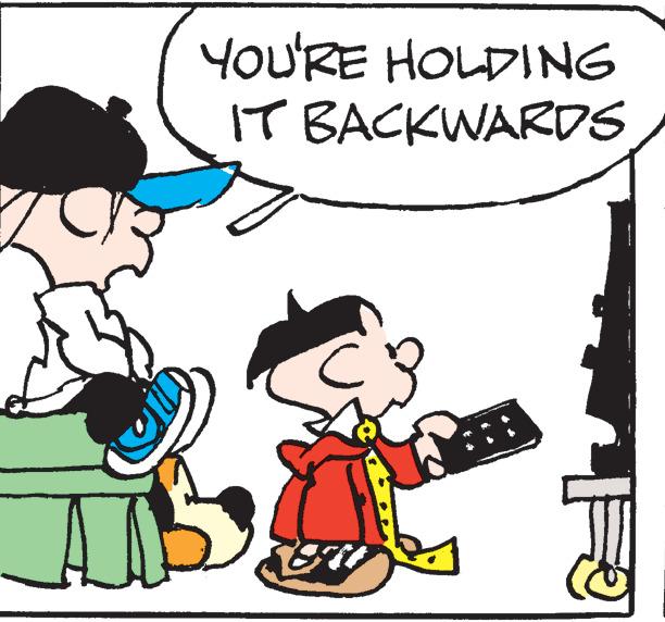 Mammal OCR: YOU'RE HOLDING IT BACKWARDS YOU'RE HOLDING IT BACKWARDS
