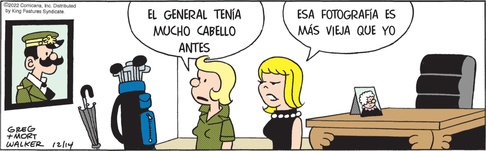 People OCR: ?2022 ComicanaInc. Distributed by King Features Syndicate. GREG +MORT WALKER 12/14 EL GENERAL TENÍA MUCHO CABELLO ANTES Y GOOD STOR ESA FOTOGRAFÍA ES MÁS VIEJA QUE YO E3 ?2022 ComicanaInc. Distributed by King Features Syndicate . GREG + MORT WALKER 12/14 EL GENERAL TENÍA MUCHO CABELLO ANTES Y GOOD STOR ESA FOTOGRAFÍA ES MÁS VIEJA QUE YO E3