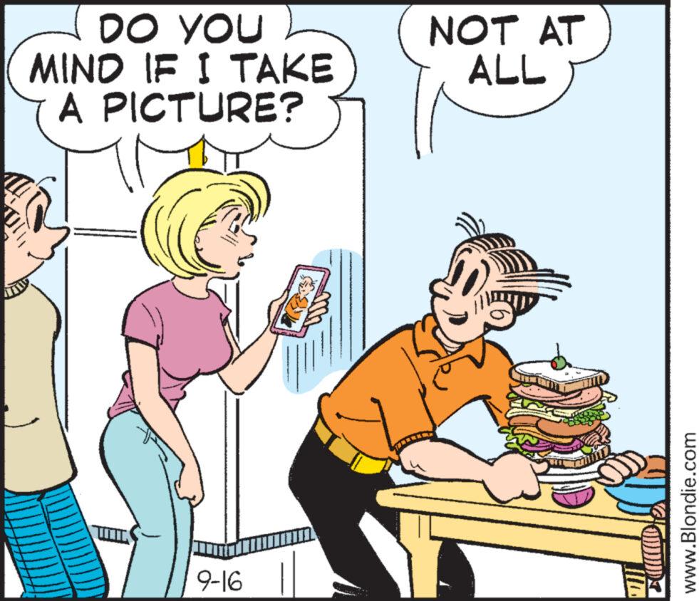 Rectangle OCR: DO YOU MIND IF I TAKE A PICTURE? 9-16 NOT AT ALL www.Blondie.com DO YOU MIND IF I TAKE A PICTURE ? 9-16 NOT AT ALL www.Blondie.com