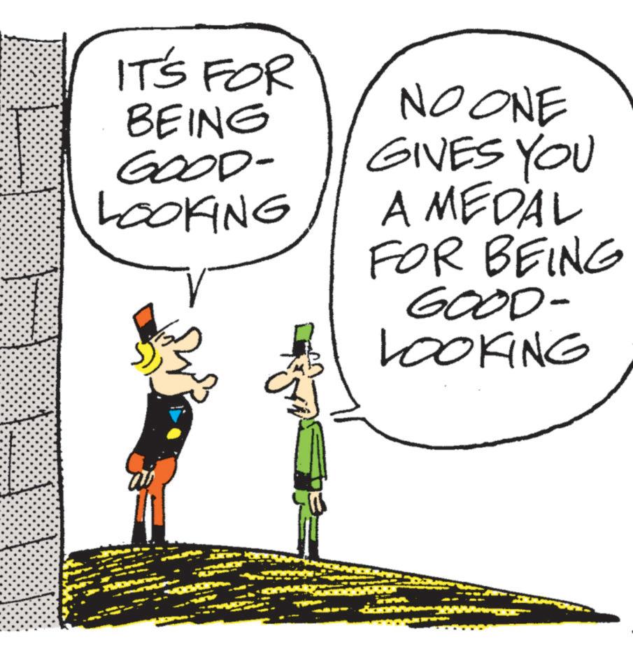 Photo caption OCR: IT'S FOR BEING GOOD- LOOKING V NO ONE GIVES YOU A MEDAL FOR BEING GOOD- LOOKING IT'S FOR BEING GOOD- LOOKING V NO ONE GIVES YOU A MEDAL FOR BEING GOOD- LOOKING