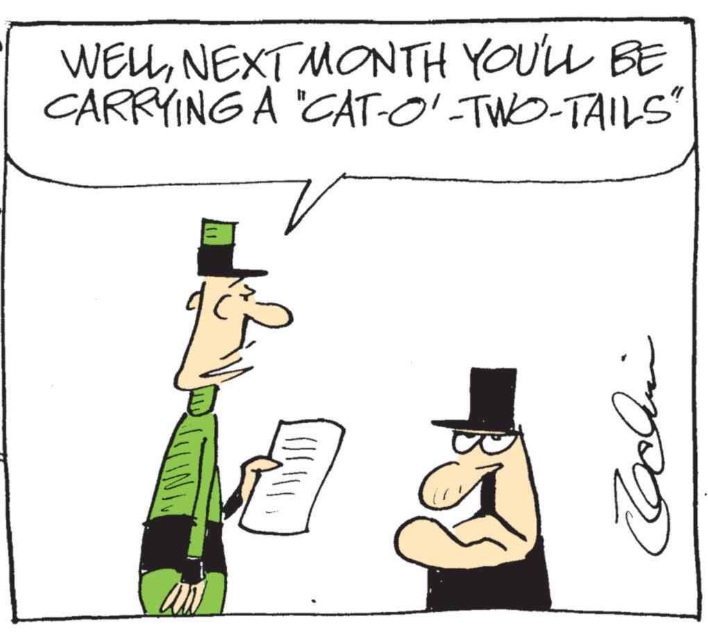 Photo caption OCR: WELLNEXT MONTH YOU'LL BE CARRYING A "CAT-O'-TWO-TAILS" C WELLNEXT MONTH YOU'LL BE CARRYING A " CAT - O ' - TWO - TAILS " C