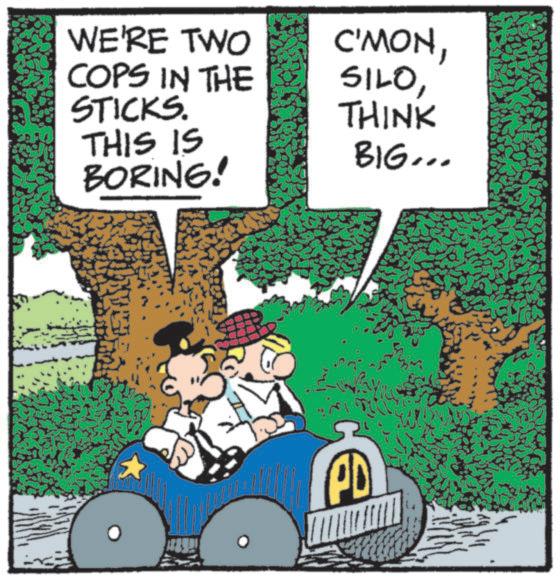 Photo caption OCR: WE'RE TWO COPS IN THE STICKS. THIS IS BORING! C'MONTHINK BIG... PD WE'RE TWO COPS IN THE STICKS . THIS IS BORING ! C'MONTHINK BIG ... PD
